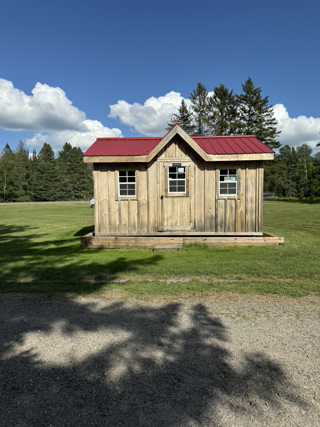 Shed after power washing — bright clean wood